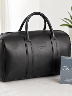NWOT. Calvin Klein Black Leather Weekender Bag and Perfume!